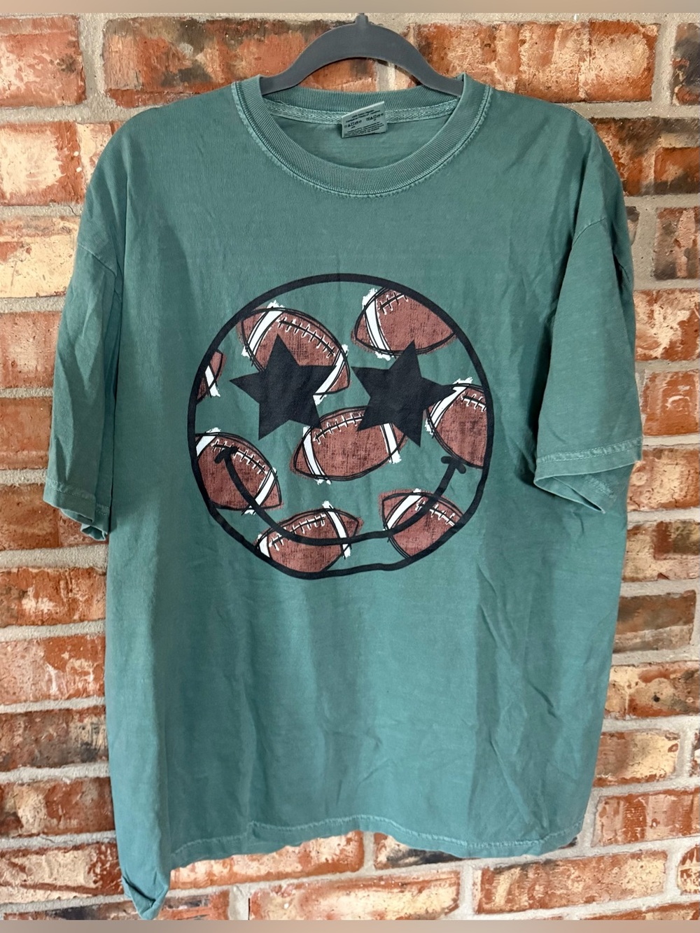Comfort Colors Green Short-Sleeve Tee with Football Smile Graphic